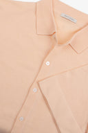 Camicia in maglia maniche corte pesca