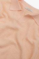 Polo in maglia collo aperto armaturata pesca