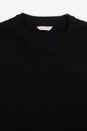 T-shirt in maglia melange nero-Dan John