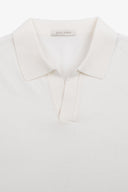 Polo in maglia collo aperto bianca