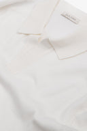 Polo in maglia collo aperto bianca
