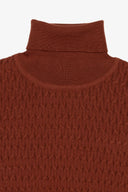 Maglia dolcevita a treccina coccio